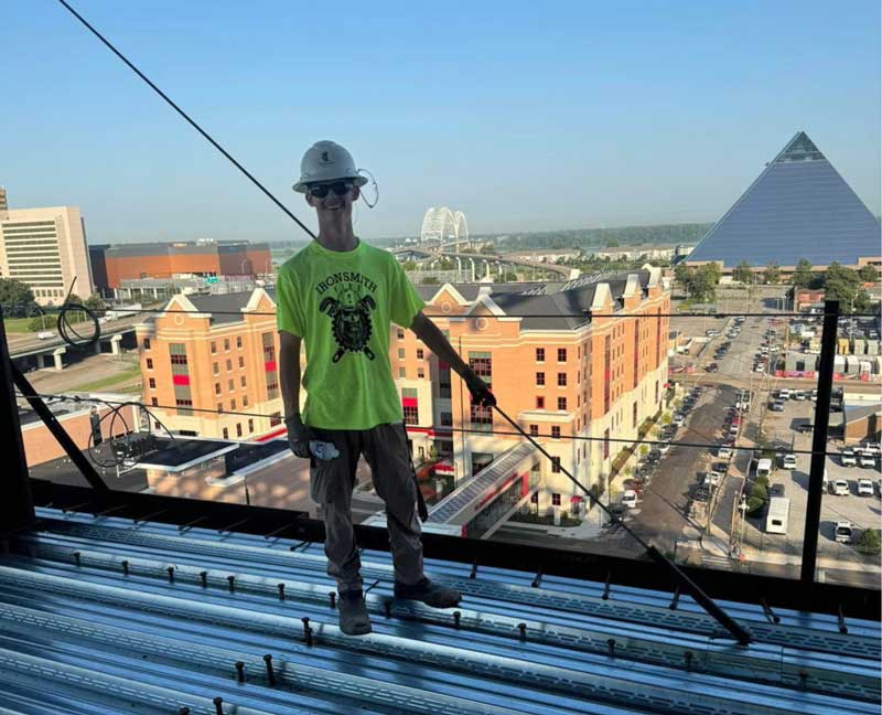 IronsmithFire team member overlooking Pyramid and Mississippi River Bridge