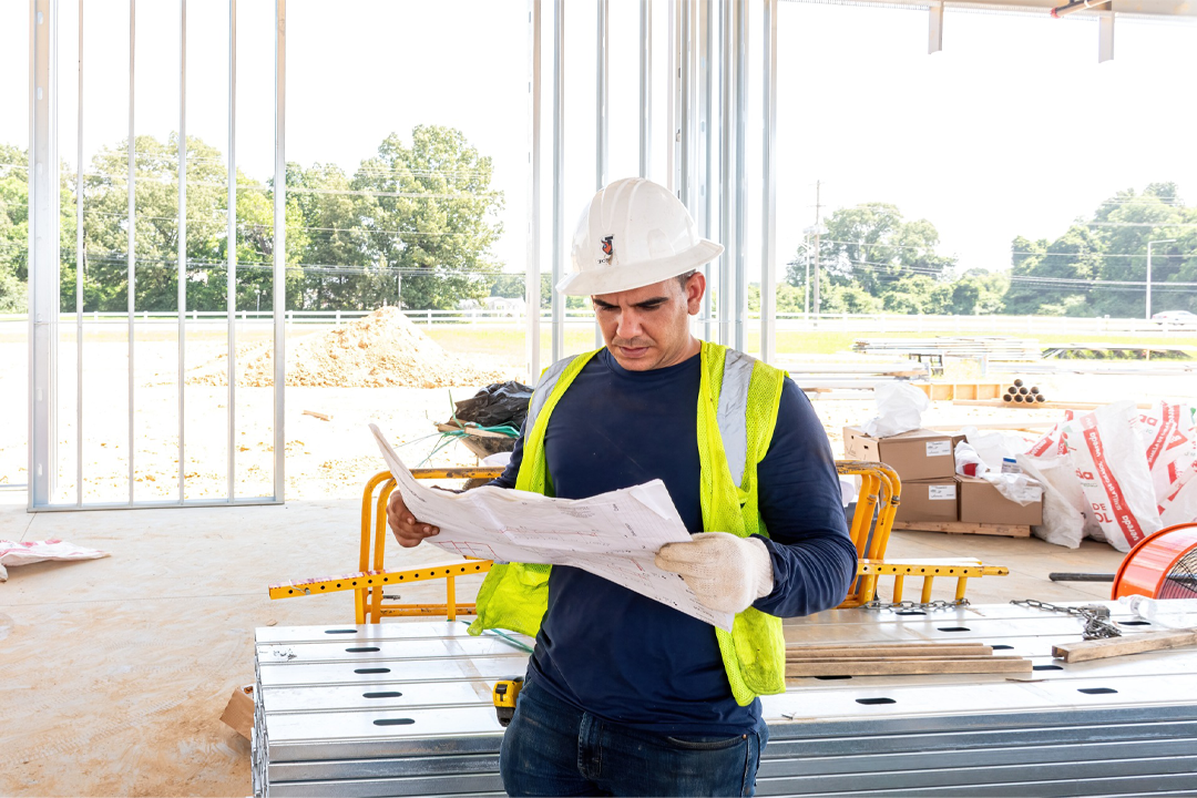 Ironsmith Fire foreman reviewing coordinated drawings on site